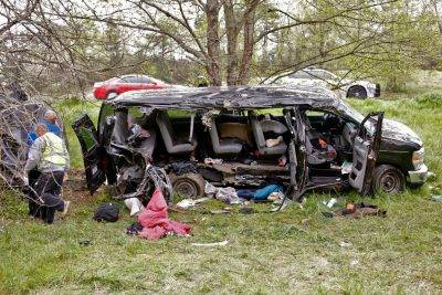 Investigators work at the scene where three people died early Monday, April 6, 2015, when a van carrying members of two heavy metal bands crashed near the town of Commerce, Ga., about 65 miles northeast of Atlanta, according to authorities. Members of the Atlanta-based band, "Khaotika, " and the Huntsville, Ala.-based band, "Wormreich, " were in the van. Georgia State Patrol Cpl. Scott Smith said the driver of the 15-passenger van "apparently fell asleep and allowed the vehicle to leave the roadway, at which time the vehicle struck a tree on the passenger side." (AP Photo/Atlanta Journal-Constitution, Bob Andres) MARIETTA DAILY OUT; GWINNETT DAILY POST OUT; LOCAL TELEVISION OUT; WXIA-TV OUT; WGCL-TV OUT